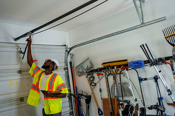 Professional Garage Door Installation technician working in Anamosa, IA